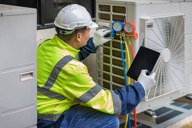 Professional Heat Pump Repair technician working in Cottonwood, AL